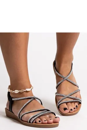 Black sandals zirconia placed on the straps
