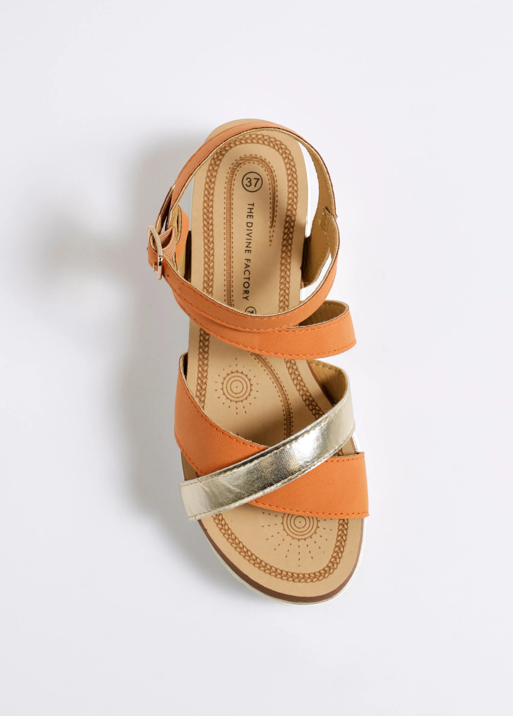 Wedge sandals with crossed straps