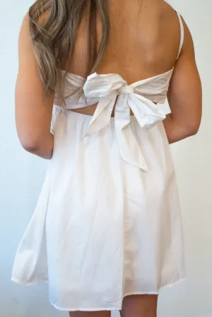 White dress with tie back